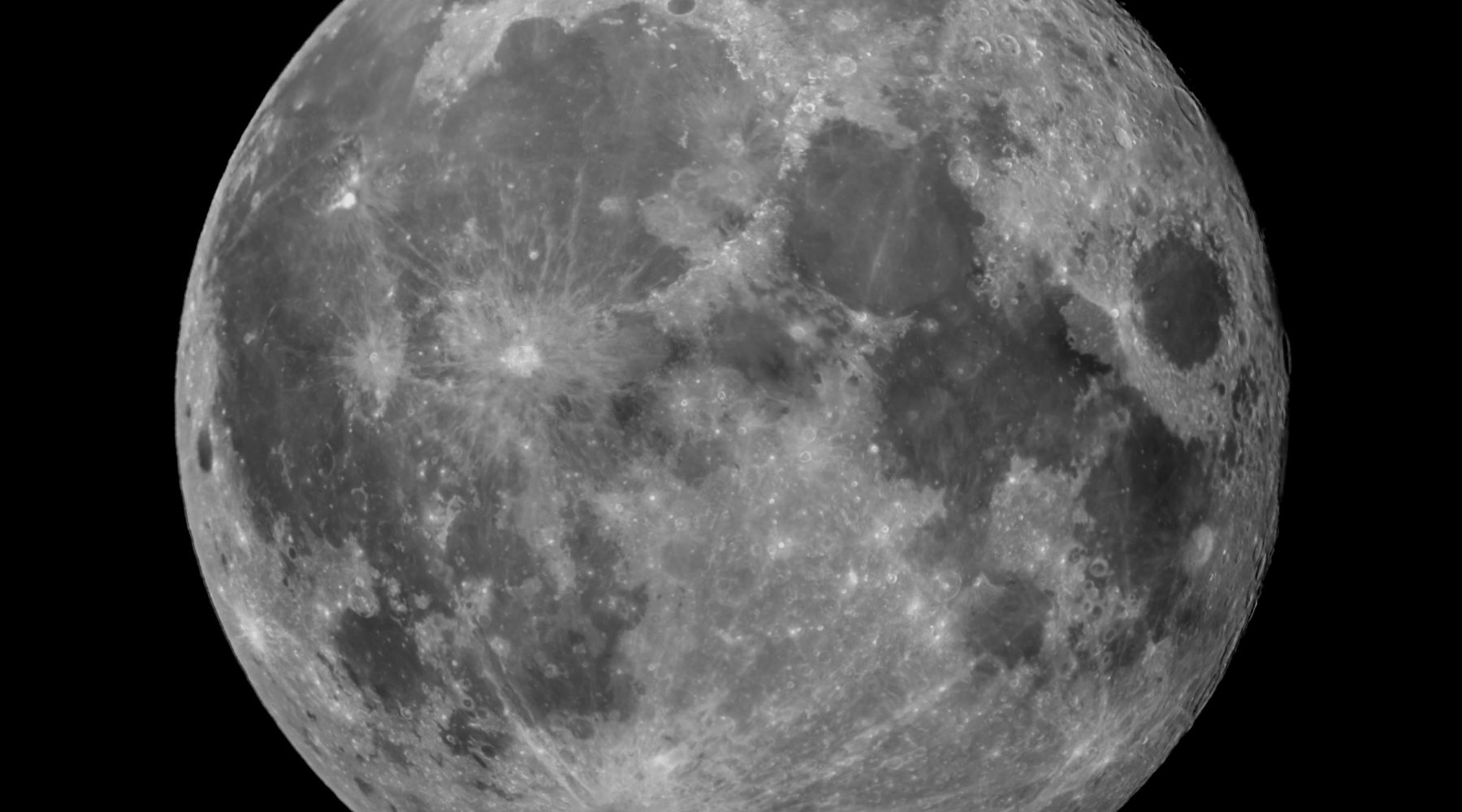 A detailed high-resolution photograph of the full moon
