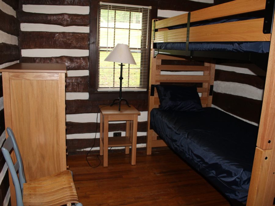 Log cabin bedroom with bunk beds